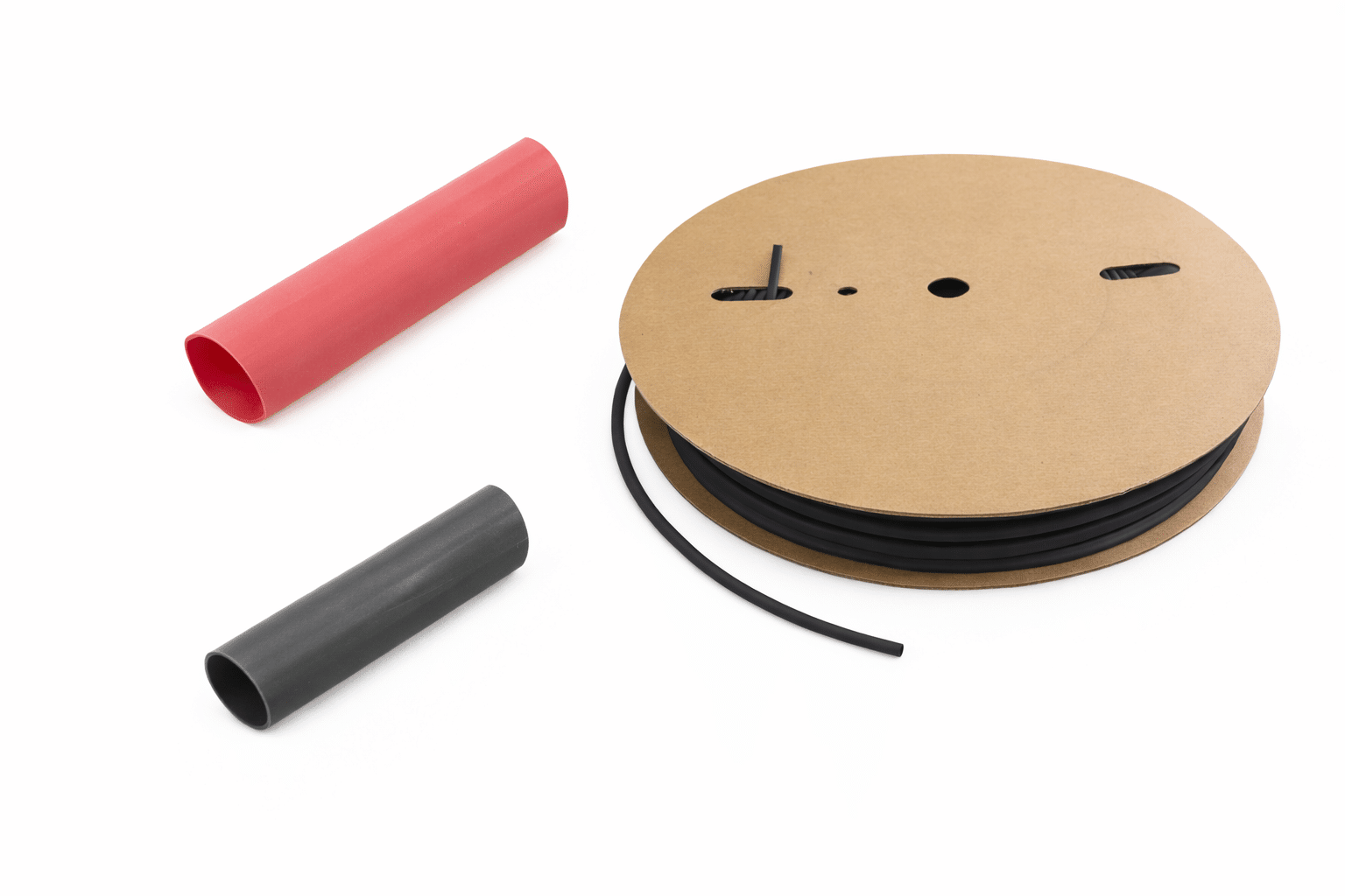 3M Heat Shrink Tubing 3M heat shrink tubing in red and black with spool of black tubing for electrical wire insulation and protection