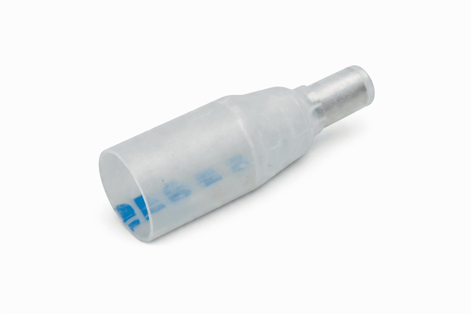 product-crimp-caps-image Clear heat shrink crimp caps with blue adhesive lining arranged on white background for electrical wire connections.